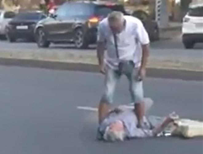 В центре Запорожья мужчина избил ногами лежащего пенсионера (ВИДЕО)