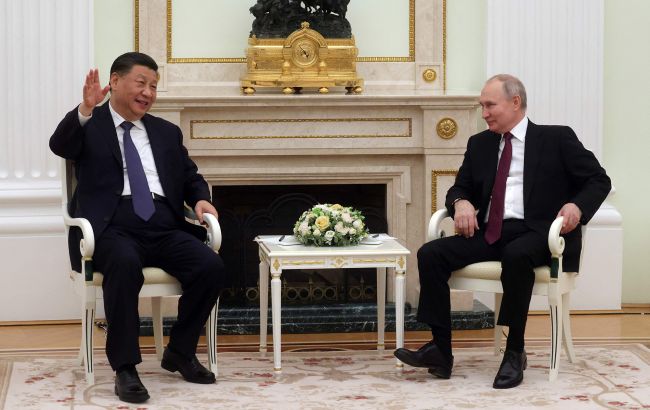 Китай таємно озброює Росію, - The Telegraph